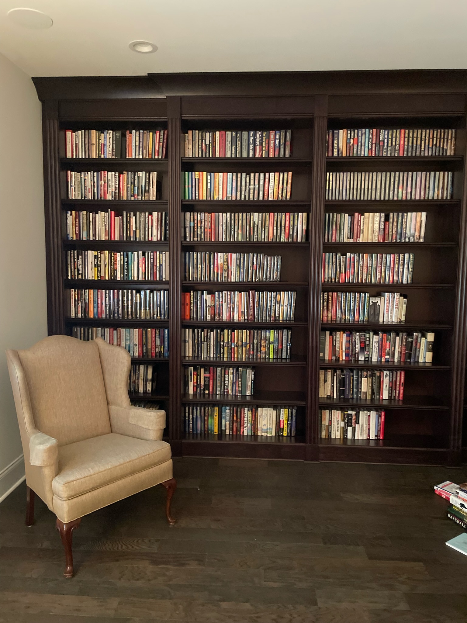 Stained custom bookcase with Fluted Panels