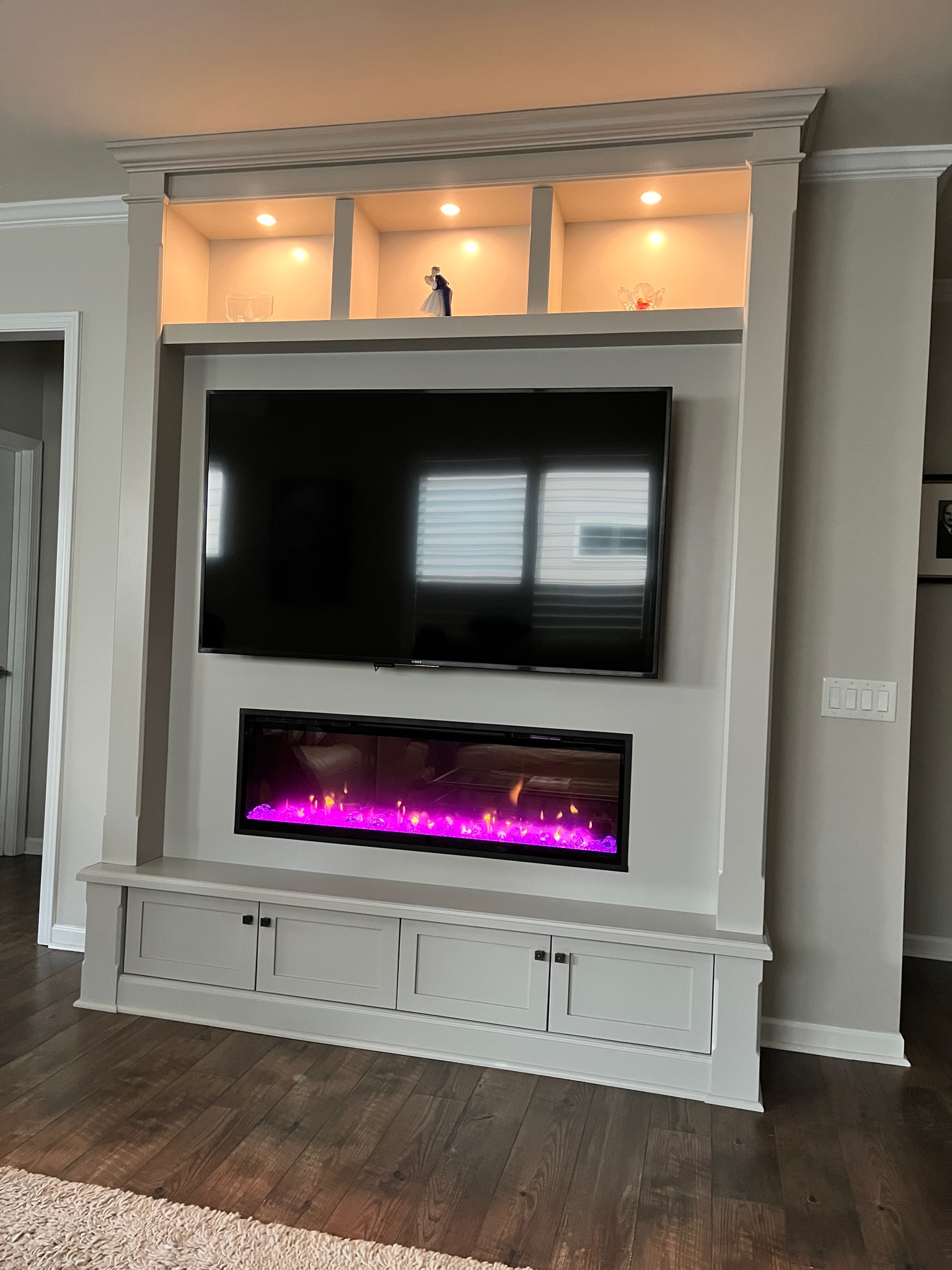 Entertainment Center with cool flames fireplace